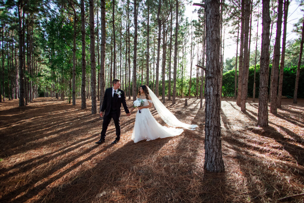 couple walking through the pines in orlando FL