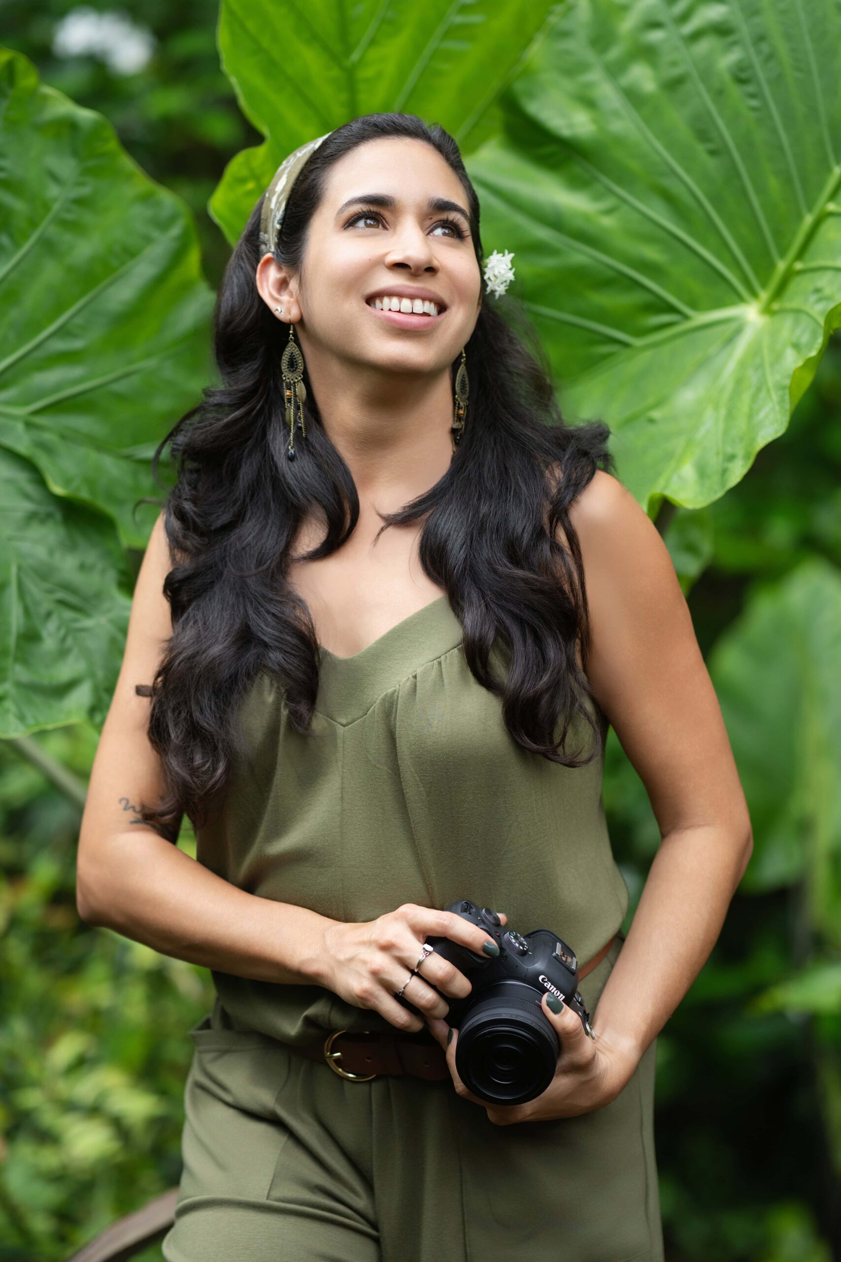 Mandy, Orlando outdoor wedding photographer, holding her camera