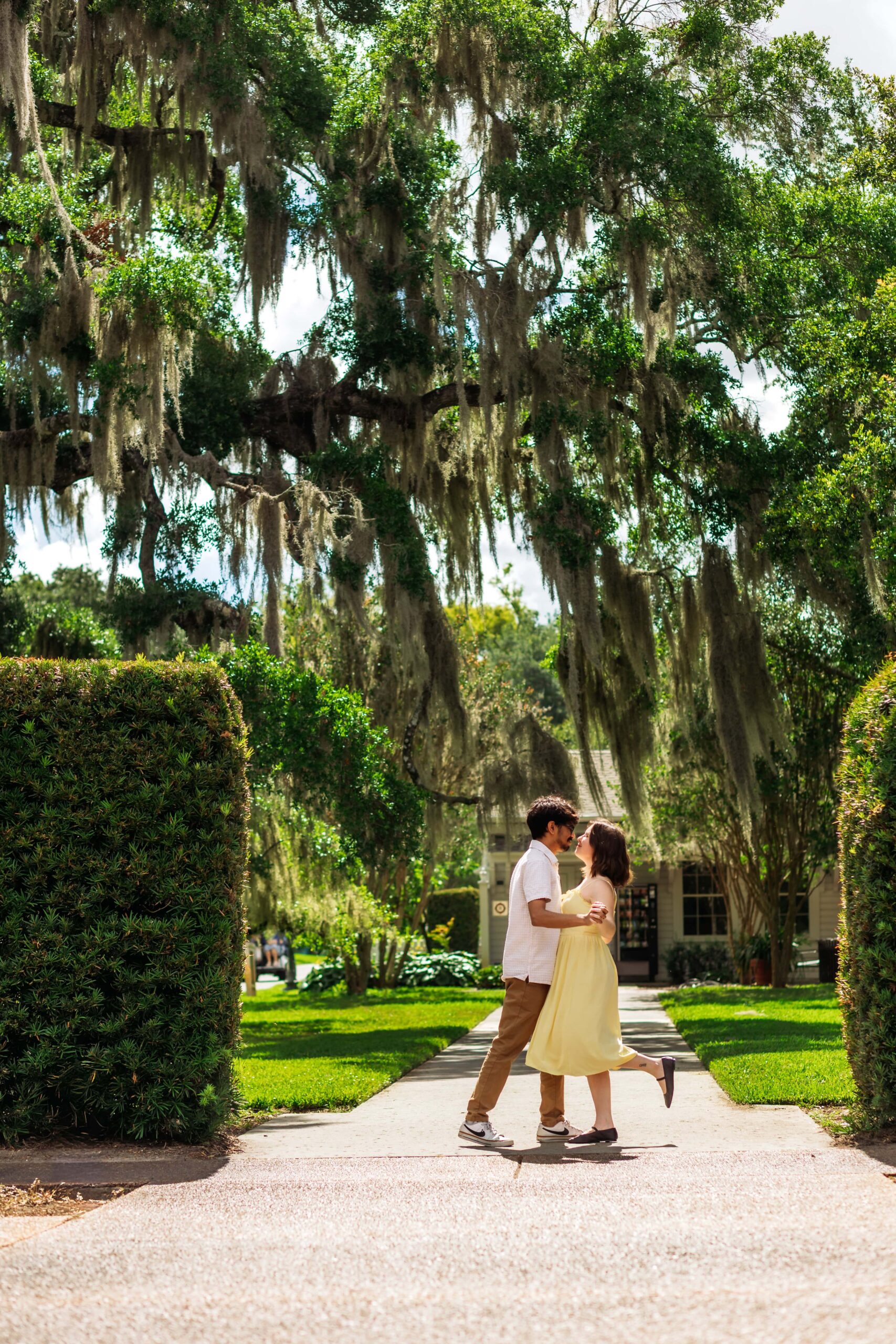 leu_gardens_engagement_photos couple dancing under the trees