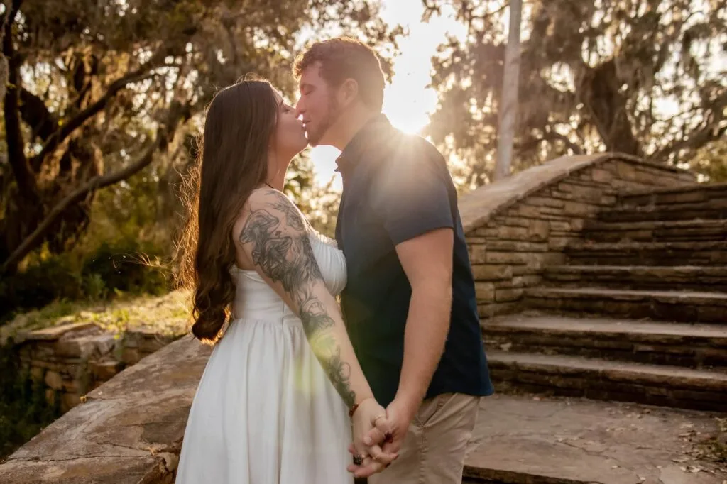 Couple Kissing at Philippe park in Tampa photoshoot